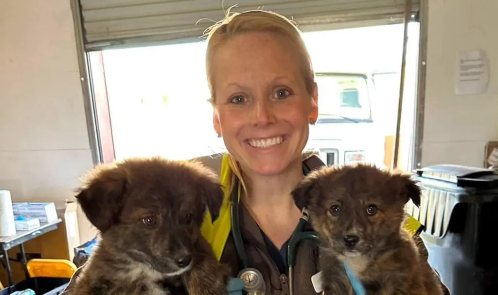 Dr. Dana Koch with puppies
