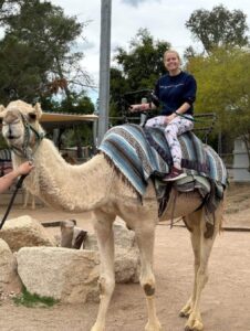 Dr. Dana Koch on a camel