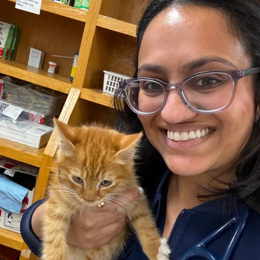 Photo of associate IndeVet Anita Patel with her cat