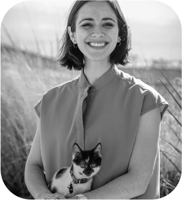 Photo of Dr. Katherine Bonvillain holding a young cat.